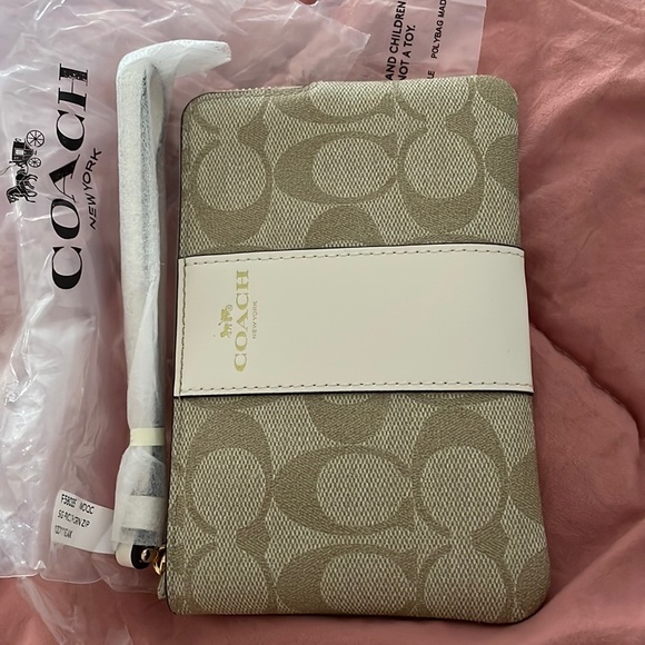 Coach Handbags - Coach chic corner zip canvas wristlet NWT
